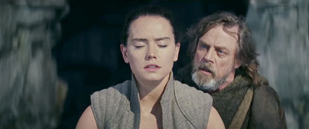 Luke Skywalker gazes in amazement at Rey in The Last Jedi