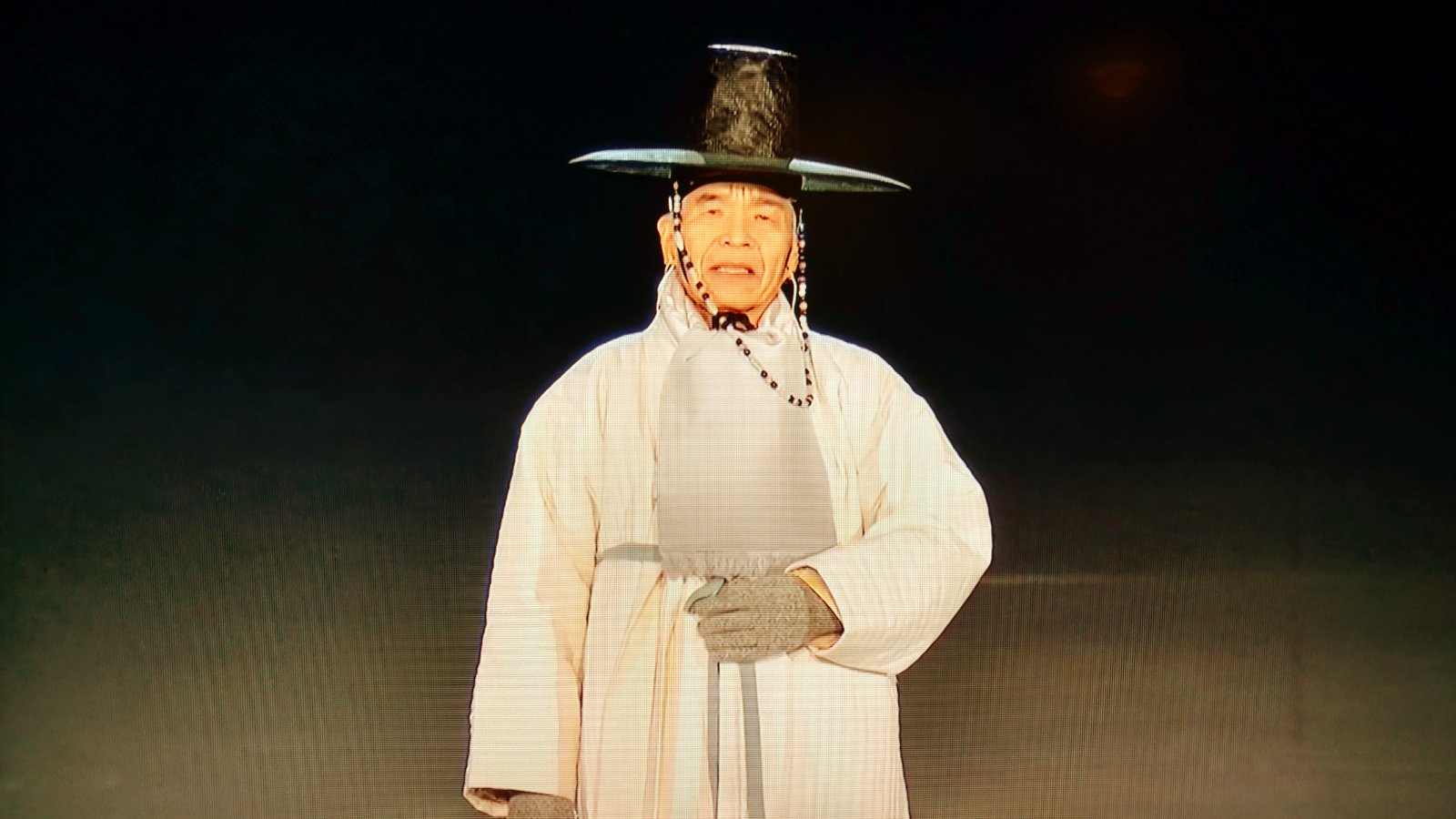 An elder sings a 600 year old song shared by both North and South Korean culture.