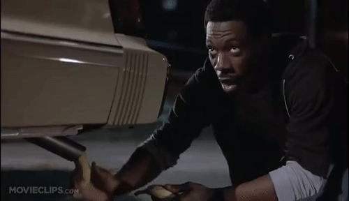 Axel Foley using the old banana in the tailpipe routine